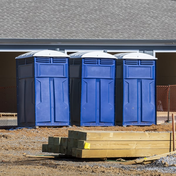 are there any restrictions on what items can be disposed of in the portable toilets in Dawson